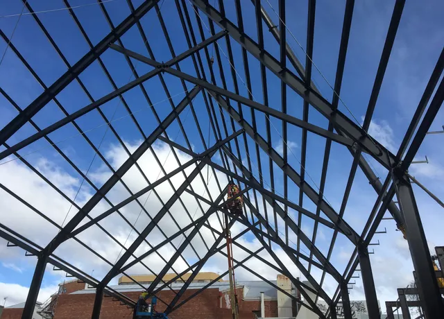 Structural steel roof frame on a commercial construction site